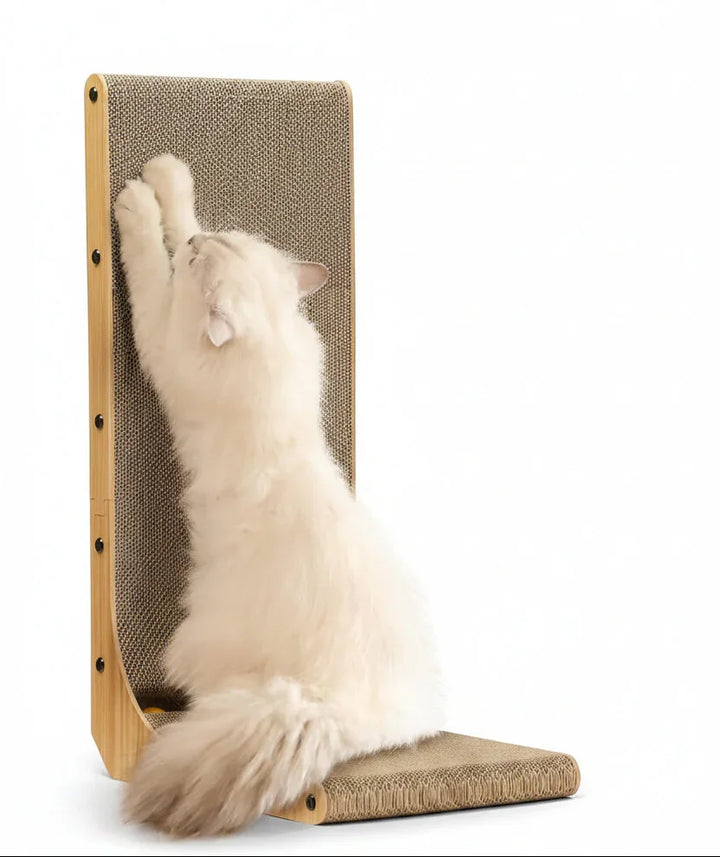 Fluffy white cat scratching on a wooden cat scratching post with cardboard surface