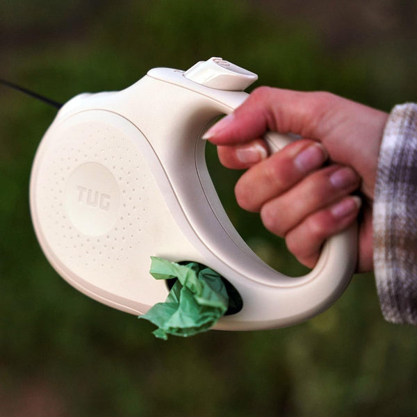 TUG Oval 360° Tangle-Free Retractable Dog Leash with Integrated Waste Bag Dispenser (Small, Cream)3