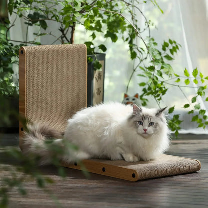 Fluffy white cat lounging on a wooden scratcher with sisal surface, surrounded by greenery.5