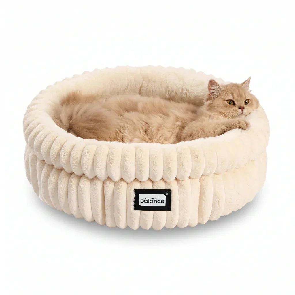 fluffy-cream-cat-bed-with-ribbed-design-cozy-pet-nest-for-cats-soft-plush-sleeping-spot