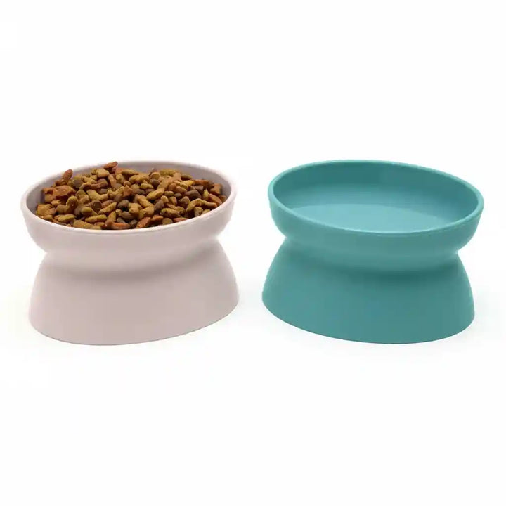 Elevated pet bowls with dry food and water, ideal for cats and dogs
