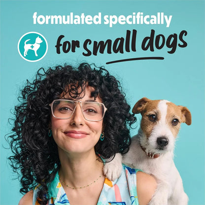 Woman holding small dog with text 'formulated specifically for small dogs' on teal background4