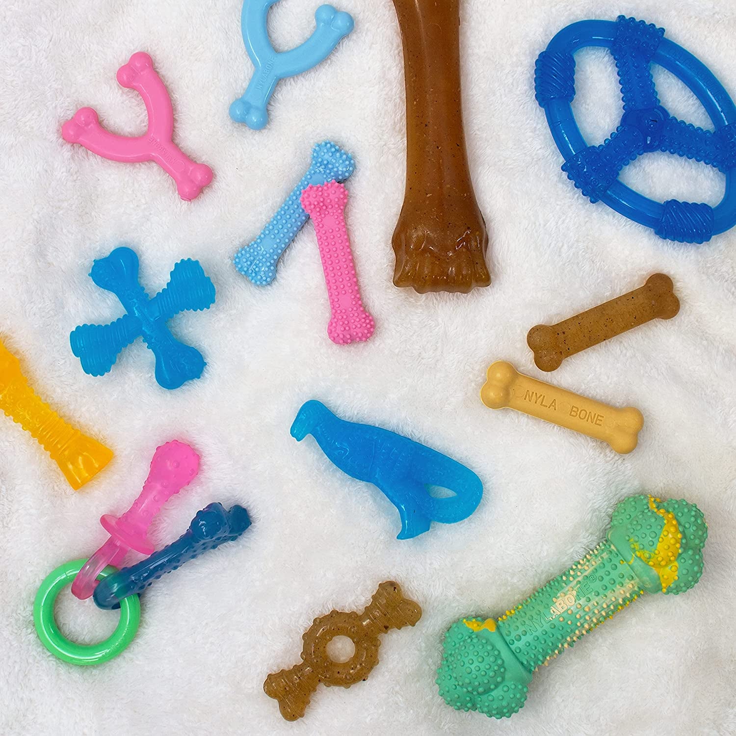 nylabone-puppy-chew-teething-ring-bone-dog-toy-chicken-flavor-x-small-soothing-teething-toys-for-puppies-puppy-enrichment-teething-relief-freezable-for-added-comfort-dogs-up-to-15-lbs